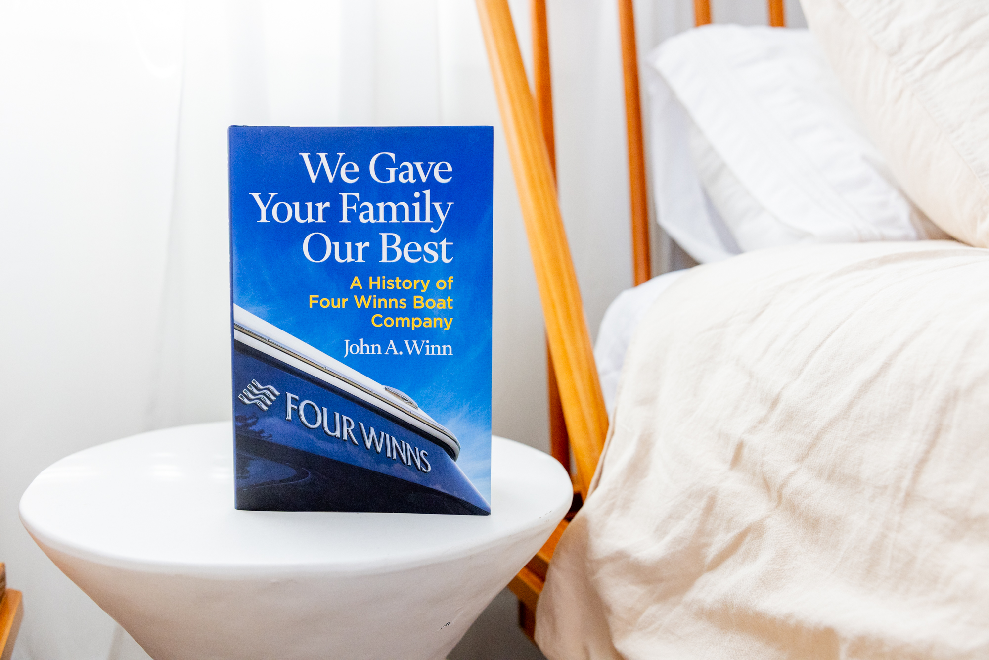 Four Winns Family Legacy Book on Table